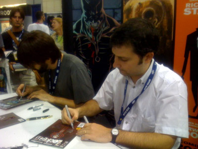 Joe Hill signing copies of 'Locke & Key' at the  IDW Publishing booth.