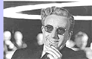 Strangelove suffers from "alien hand syndrome"