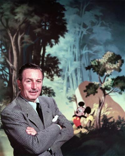 Walt Disney posing against landscape backdrop containing Mickey Mouse. 1950 photo by Alfred Eisenstaedt.