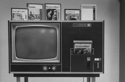 Cartrivision video tape cartridge inserted in side pocket of AVCO TV set. 1970 photo by Michael Rougier