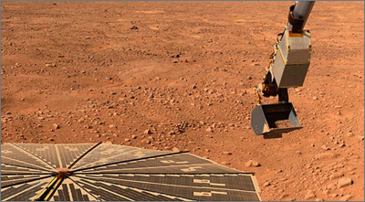 The Phoenix Mars Lander’s solar panel and robotic arm in an image taken June 10, 2008.