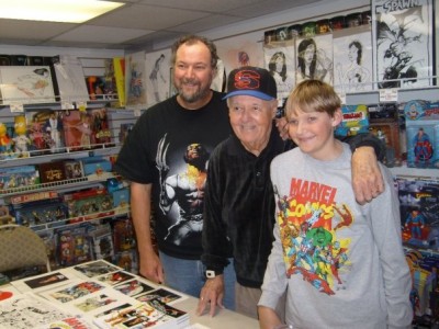 Joe Sinnott poses with his son and grandson